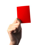 Hand holding a red card isolated on white background